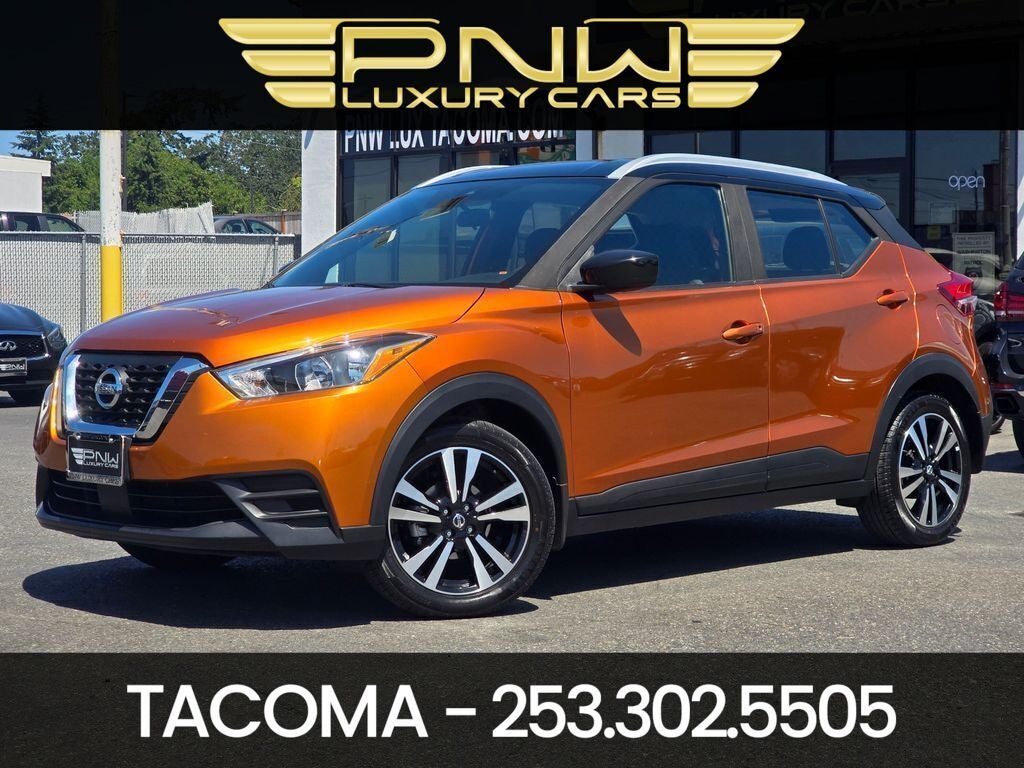 2020 Nissan Kicks SV in Monarch Orange/Super Black — front three-quarter view