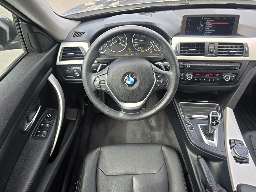 2014 BMW 3 Series — side profile view
