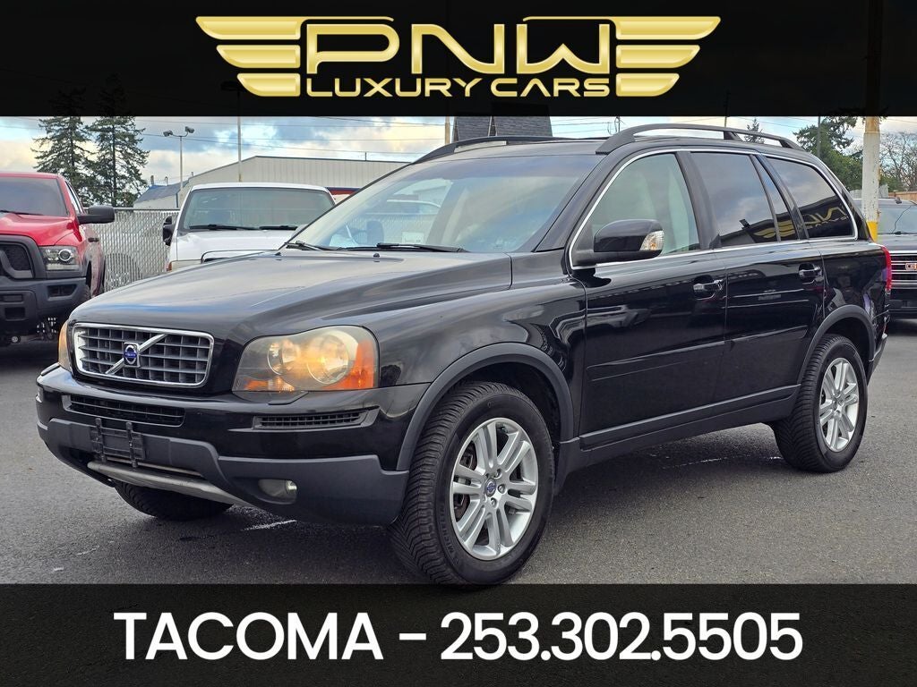 2009 Volvo XC90 3.2 in Caper Green Metallic — front three-quarter view